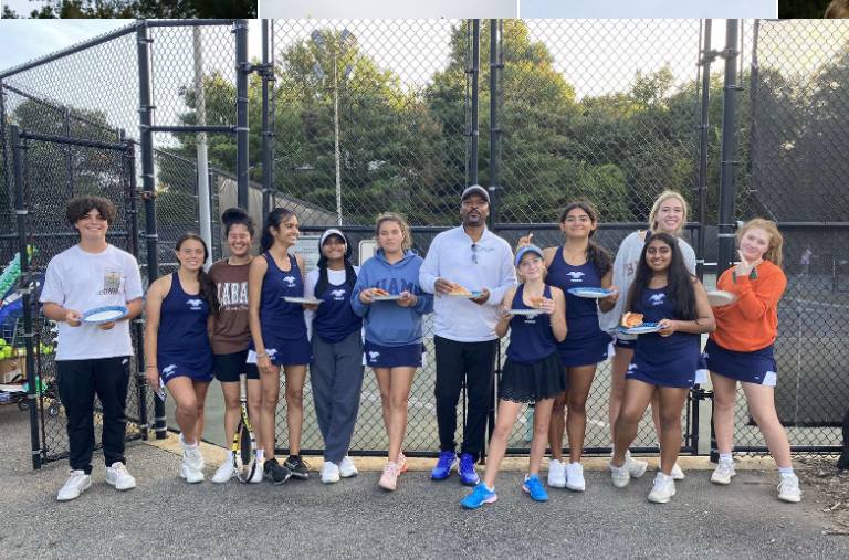 Girls Tennis Team Playing For the Crown